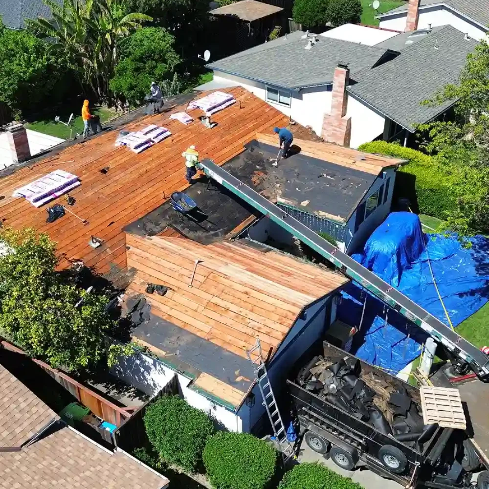 roofing-crew-working-on-a-roof-replacement-project